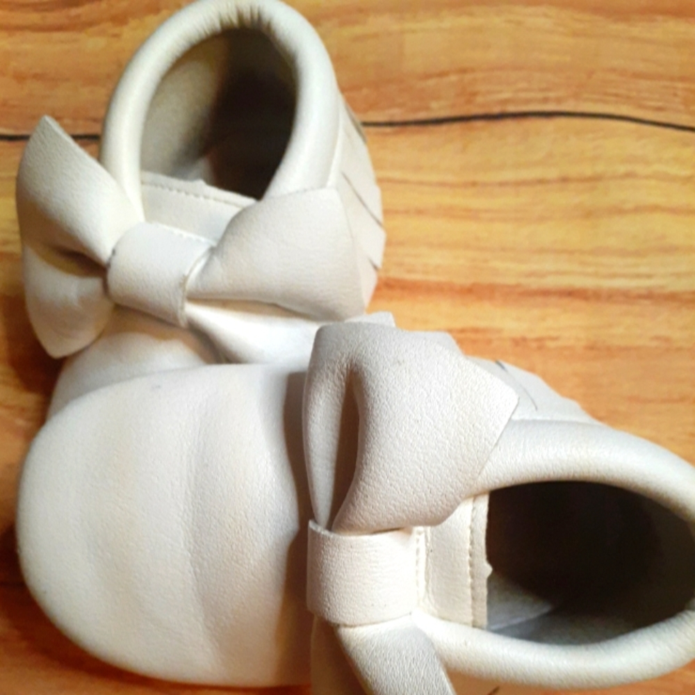 White soft slip ons